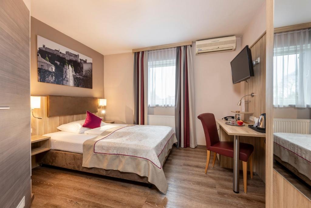 Posteľ alebo postele v izbe v ubytovaní HOTEL junior by MAX 70