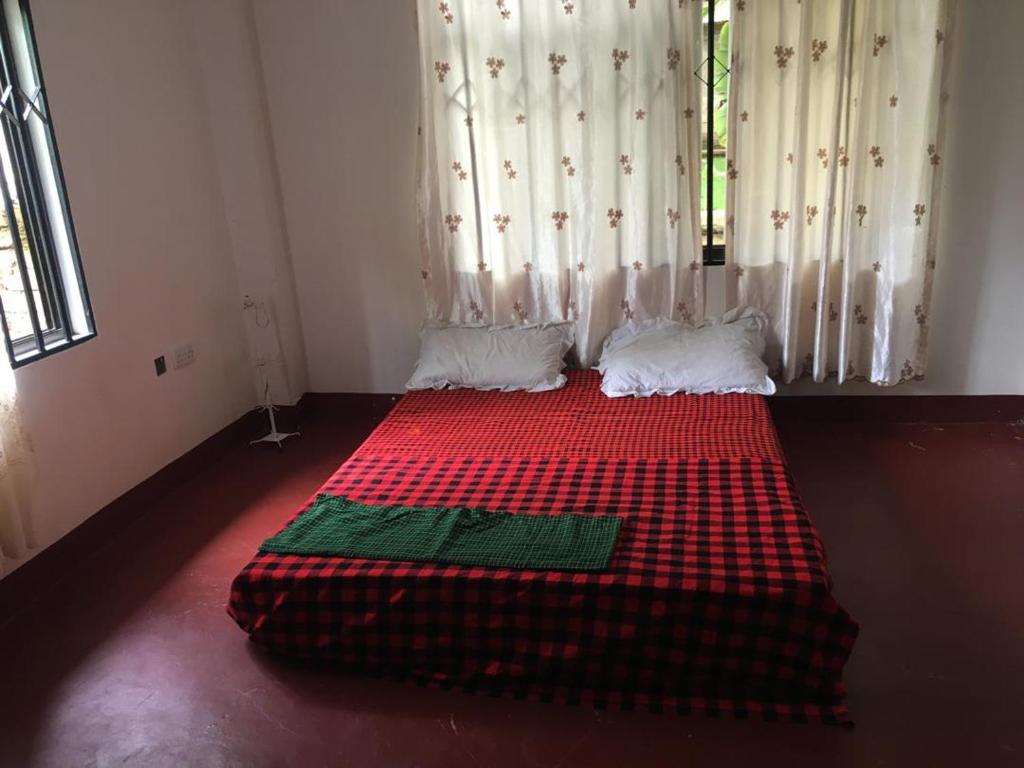 Postel nebo postele na pokoji v ubytování Humphrey home stay