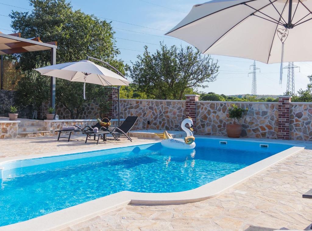 Bazén v ubytování Holiday Home Rider nebo v jeho okolí