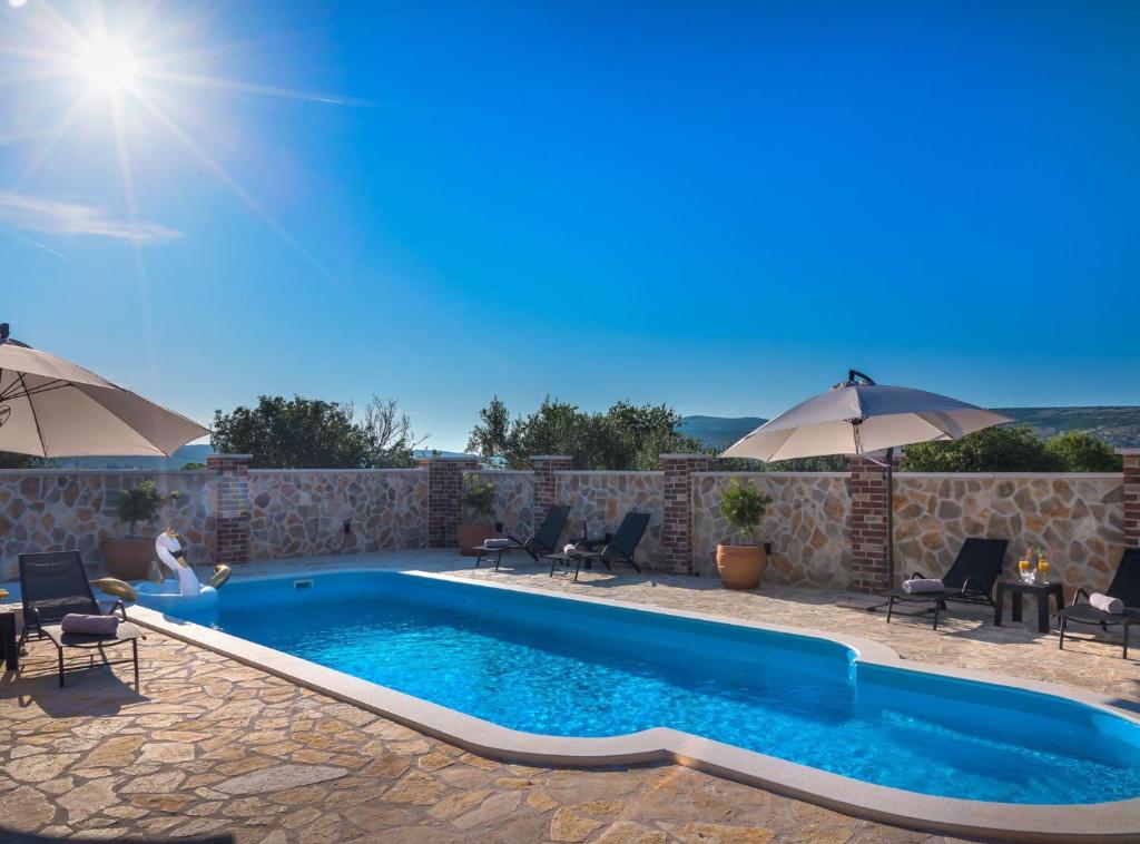 Bazén v ubytování Holiday Home Rider nebo v jeho okolí