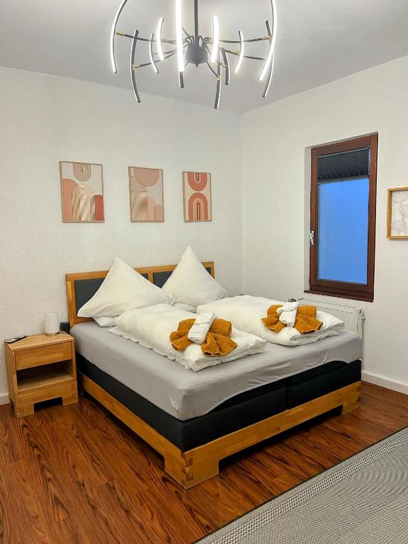 Postel nebo postele na pokoji v ubytování Sahara Hosting Apartments Nürnberg City Room 3