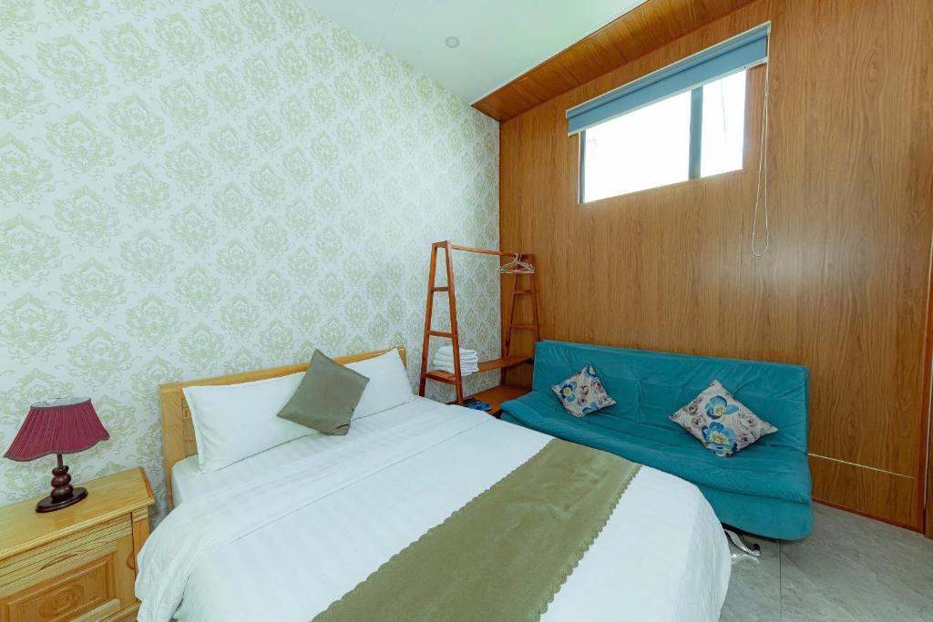 Giường trong phòng chung tại Sunrise Valley Dalat Hotel