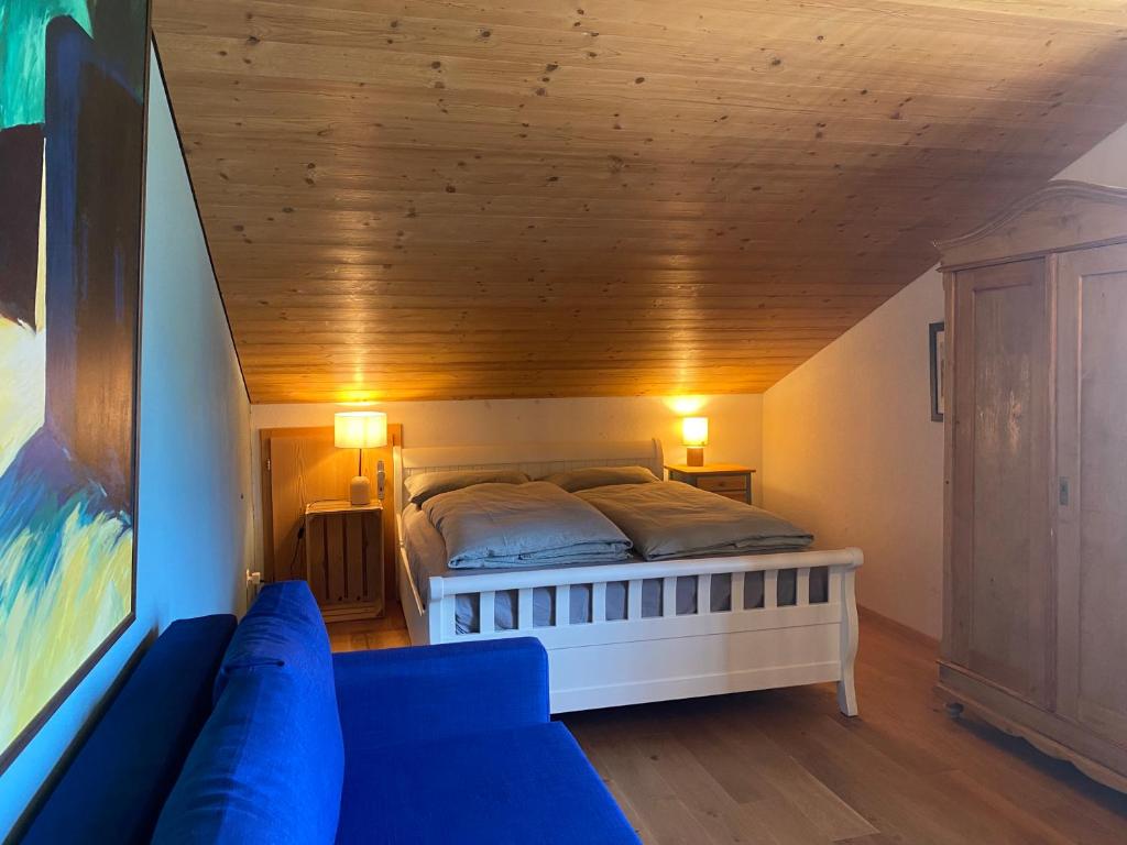 Postel nebo postele na pokoji v ubytování Chalet Seeblick