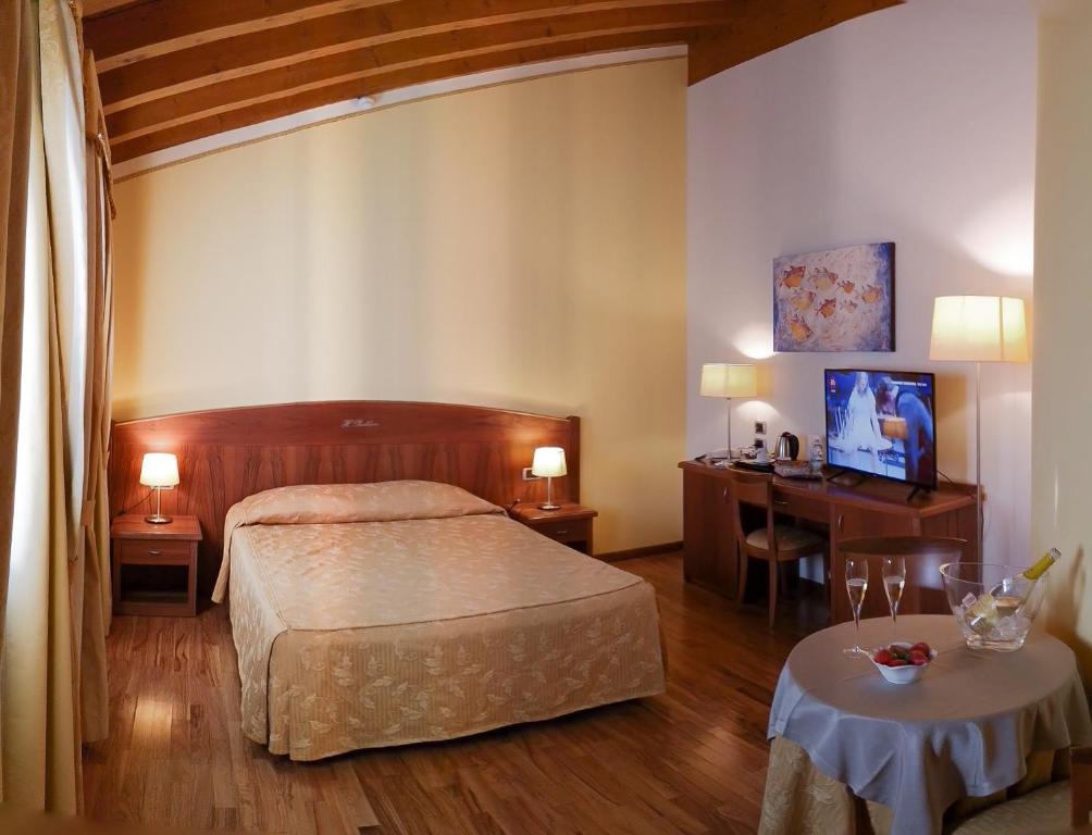 Postel nebo postele na pokoji v ubytování Hotel Purlilium
