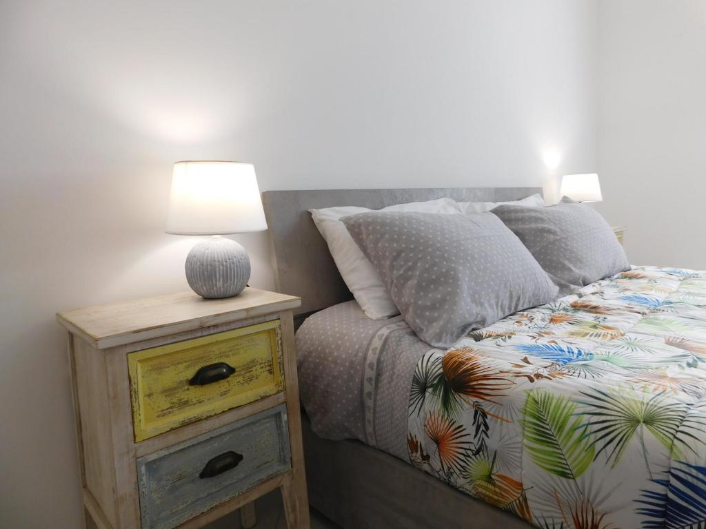 Letto o letti in una camera di Lovely PitStop Fiumicino