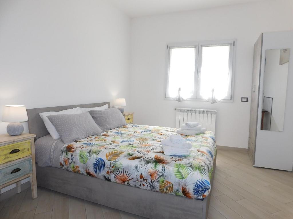 Letto o letti in una camera di Lovely PitStop Fiumicino