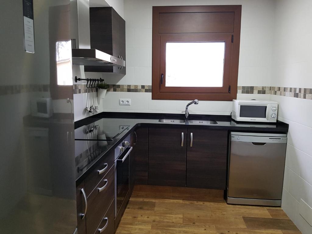 Kuchyň nebo kuchyňský kout v ubytování Casa Climent