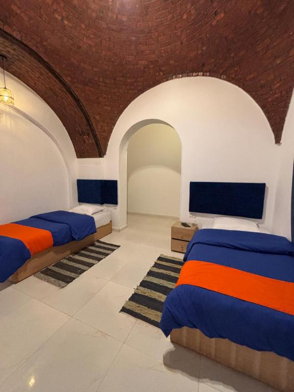 Postel nebo postele na pokoji v ubytování JAREEDY Guest house