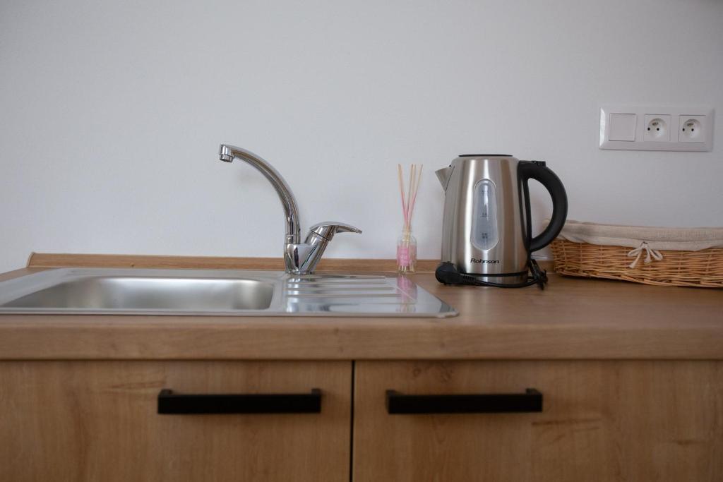 Kuchyň nebo kuchyňský kout v ubytování Apartmány Hvezdáreň