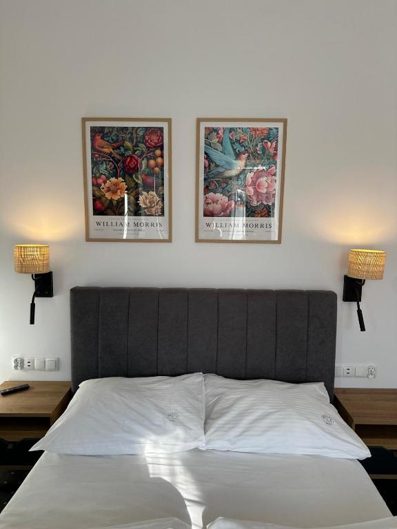 Postel nebo postele na pokoji v ubytování Hotel Portus