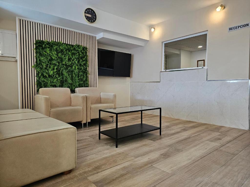 TV a/nebo společenská místnost v ubytování Hotel Velis