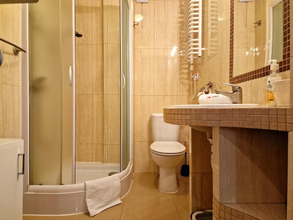 Kúpeľňa v ubytovaní ZAKOapartamenty BUTOROWY RESIDENCE