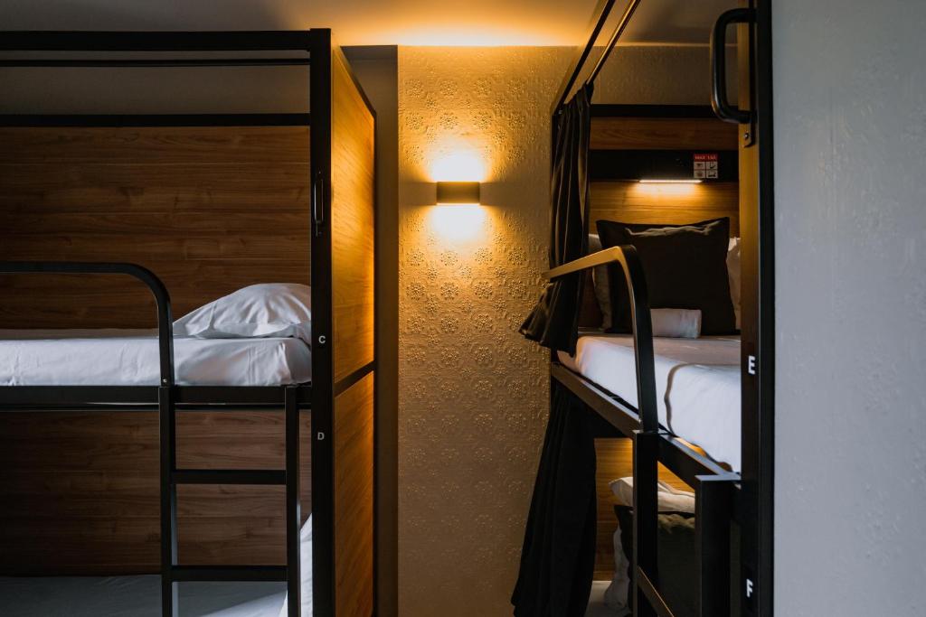 Voodi või voodid majutusasutuse HO36 Hostel Lyon toas