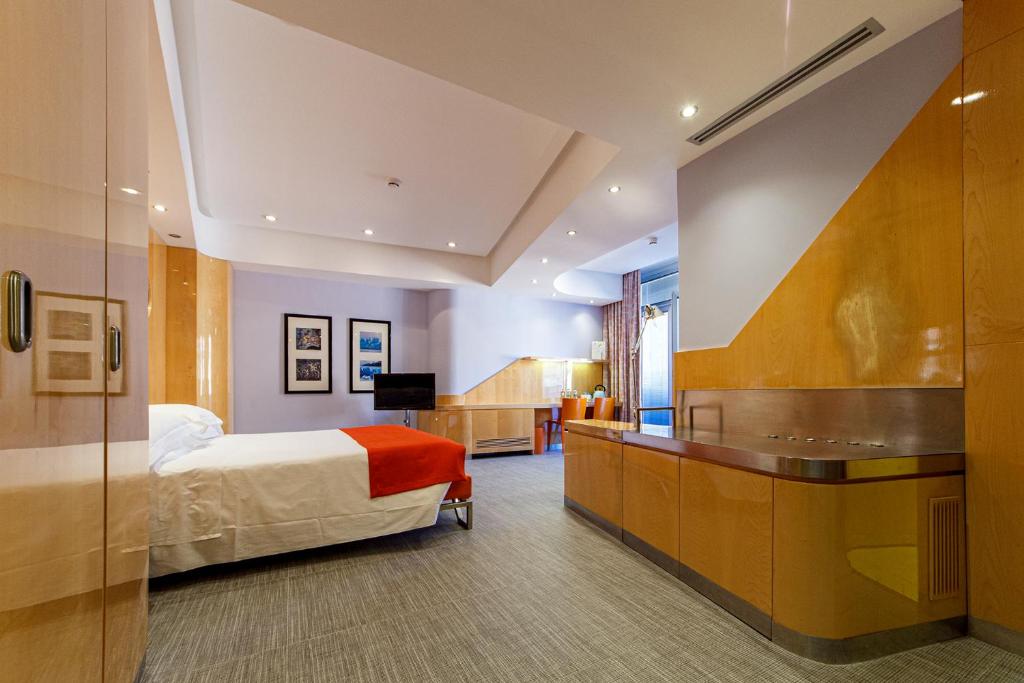 Postel nebo postele na pokoji v ubytování Albani Hotel Roma
