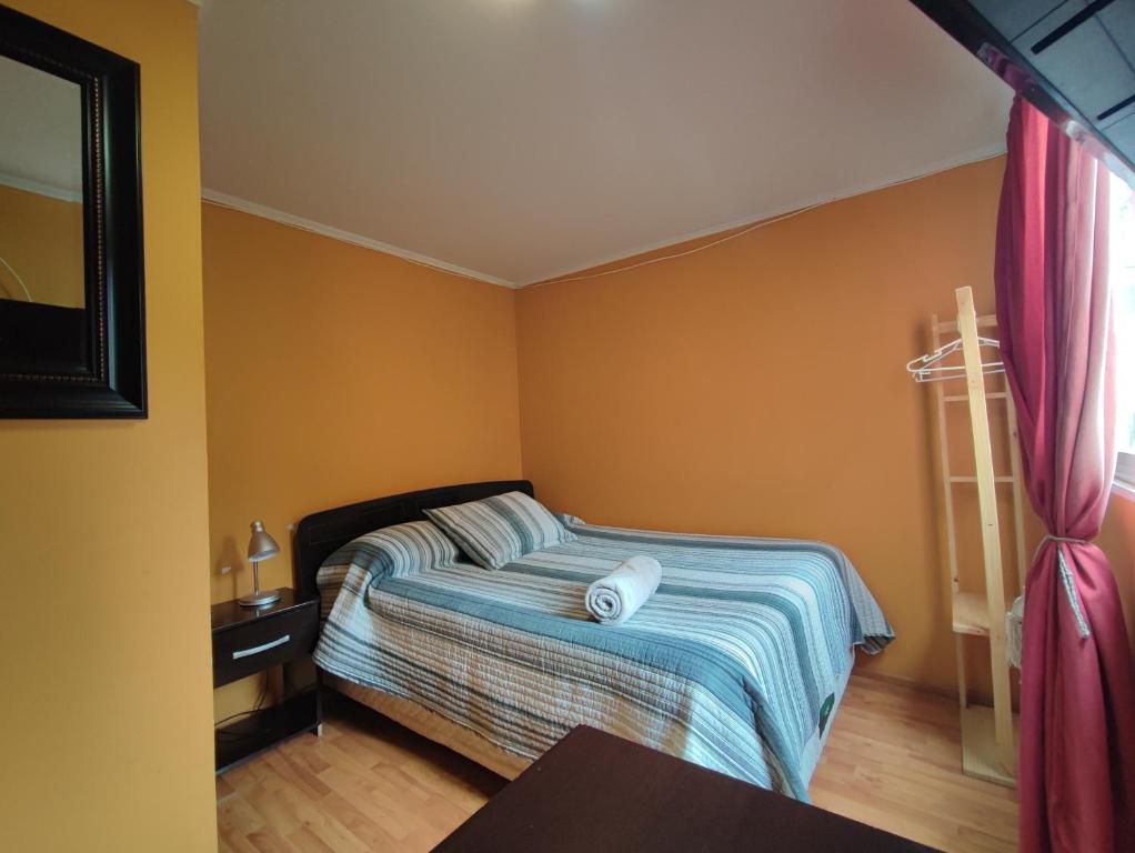 Postel nebo postele na pokoji v ubytování HOSTAL LA CASONA ALFREDO CAMPOS