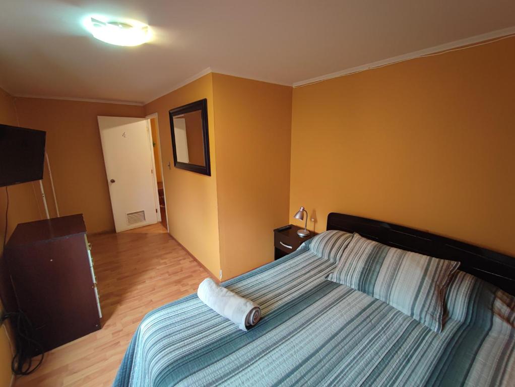 Postel nebo postele na pokoji v ubytování HOSTAL LA CASONA ALFREDO CAMPOS