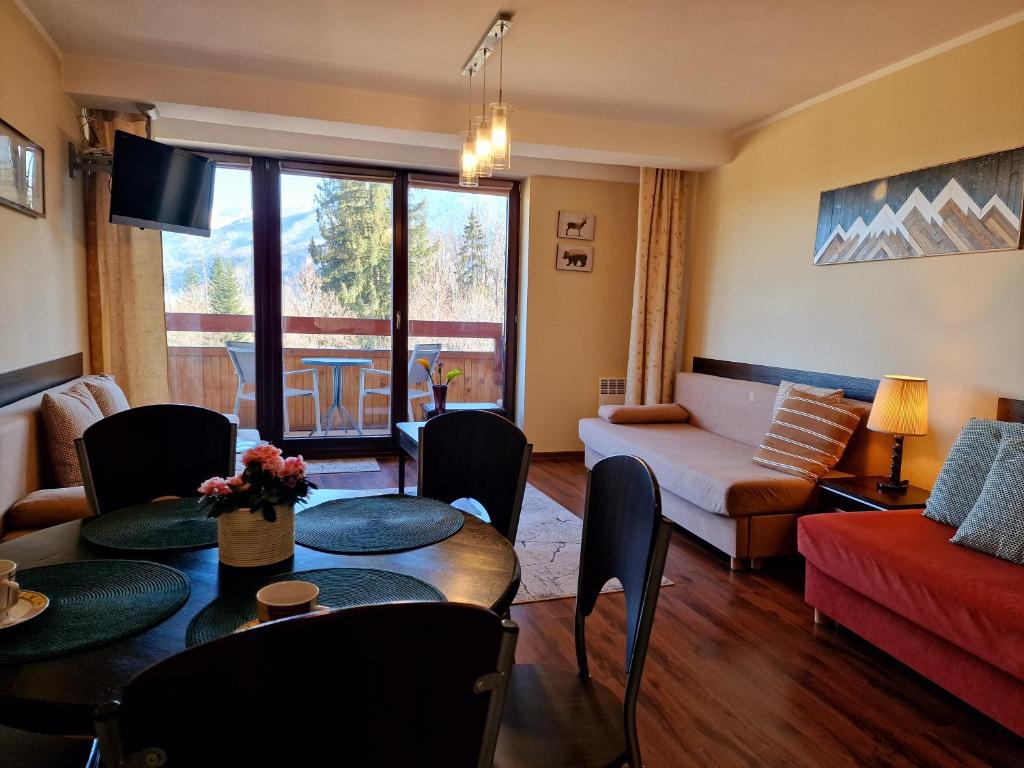 Posedenie v ubytovaní ZAKOapartamenty BUTOROWY RESIDENCE