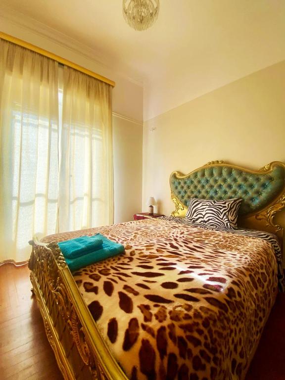 Postel nebo postele na pokoji v ubytování IRIS baroque apartment