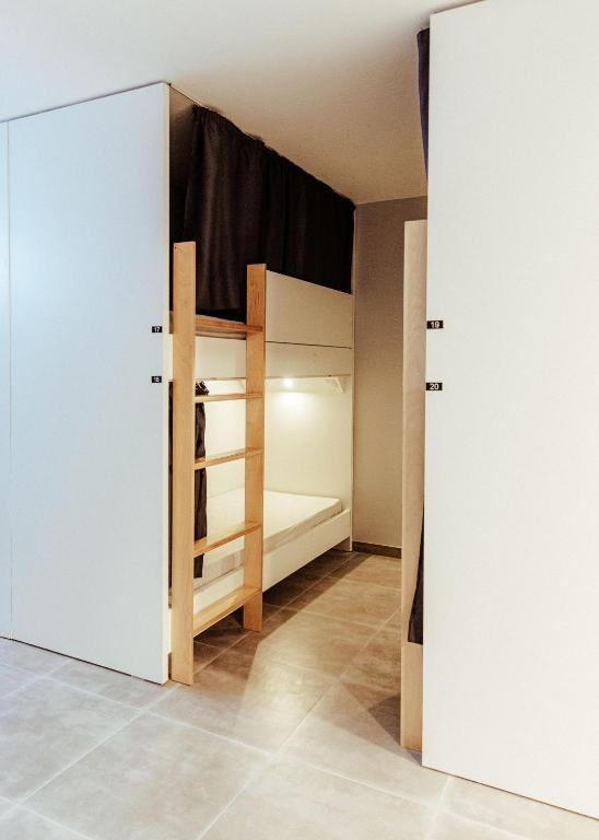 Postel nebo postele na pokoji v ubytování Arca Nova Hostel - Caminha