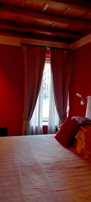 Postel nebo postele na pokoji v ubytování Palazzo Caruso