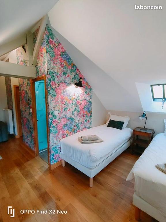 Postel nebo postele na pokoji v ubytování Domaine du Manoir de Vains