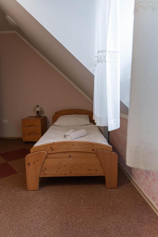 Postel nebo postele na pokoji v ubytování Martinov Hram