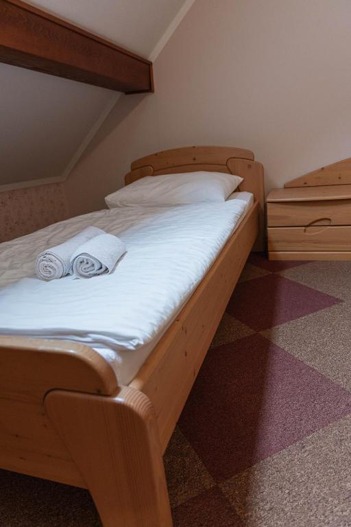 Postel nebo postele na pokoji v ubytování Martinov Hram