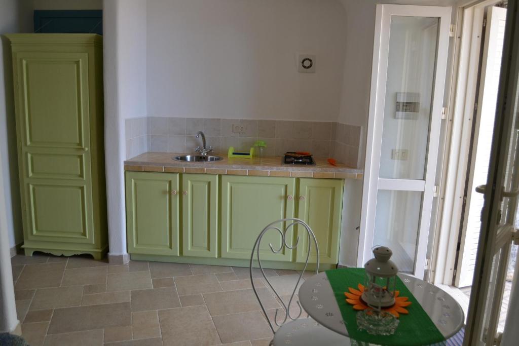 Kuchyň nebo kuchyňský kout v ubytování Maridea - Cave Apartments