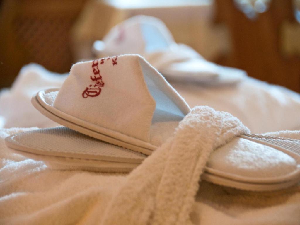 Postel nebo postele na pokoji v ubytování Hotel Tiefenbrunner