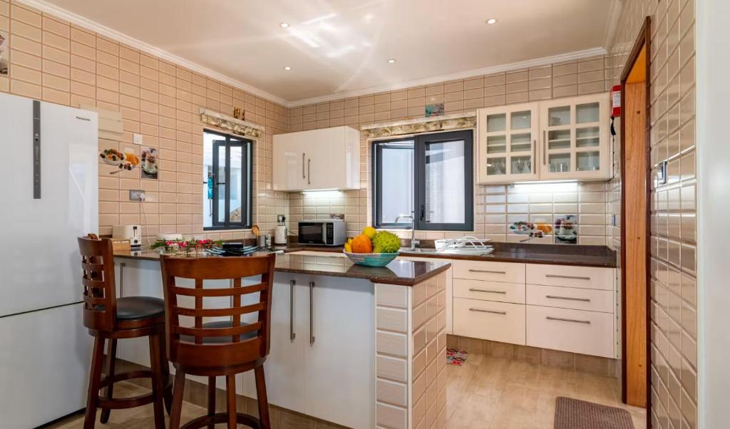Kuchyň nebo kuchyňský kout v ubytování CASA GEM
