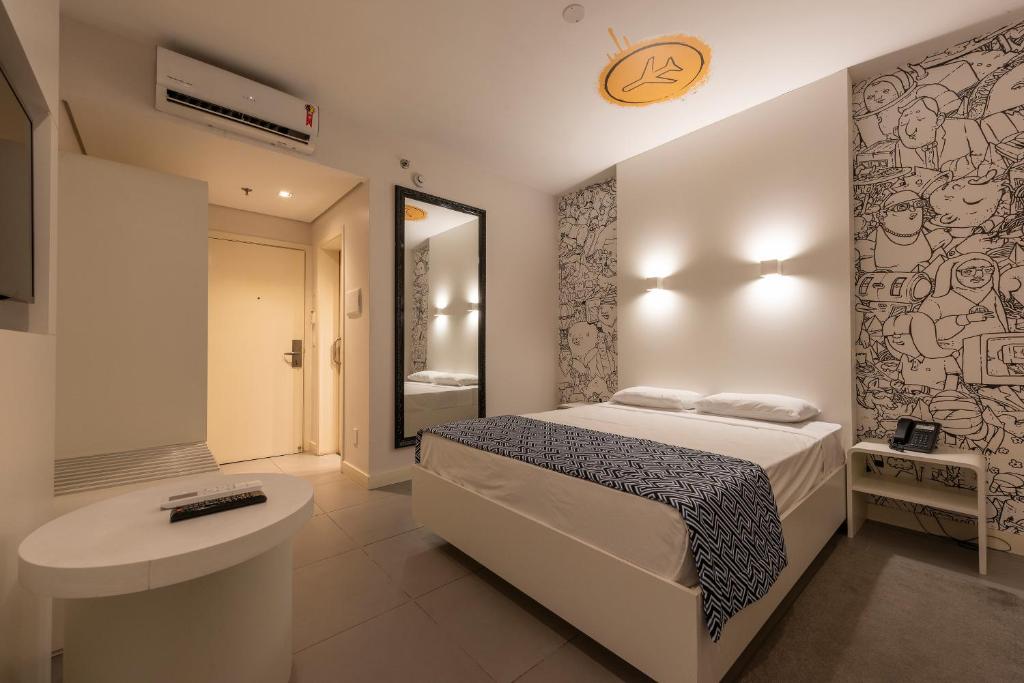 Postel nebo postele na pokoji v ubytování Hotel Nacional Inn Alagoinhas