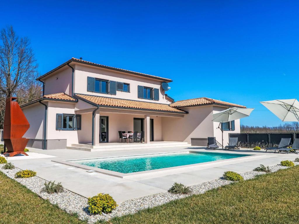 Bazén v ubytování Holiday Home Villa Temelia by Interhome nebo v jeho okolí