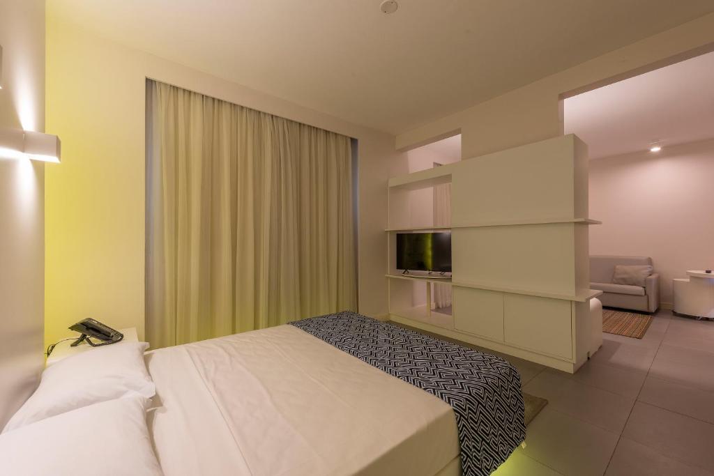 Postel nebo postele na pokoji v ubytování Hotel Nacional Inn Alagoinhas