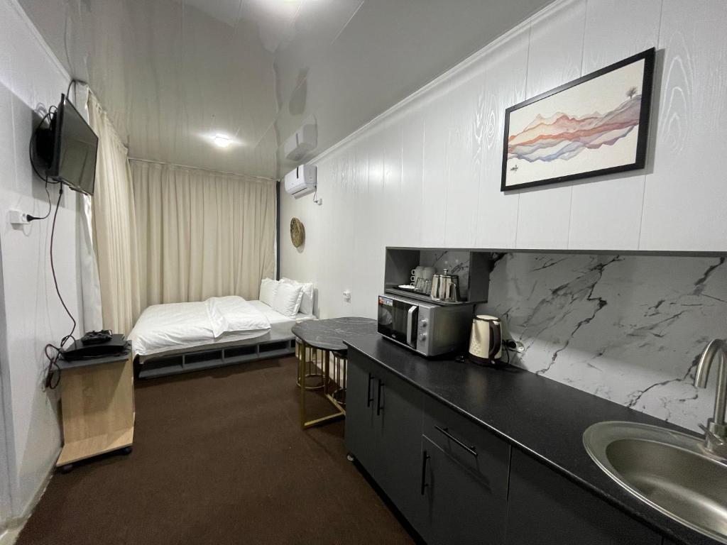 Giường trong phòng chung tại Chorvoq View