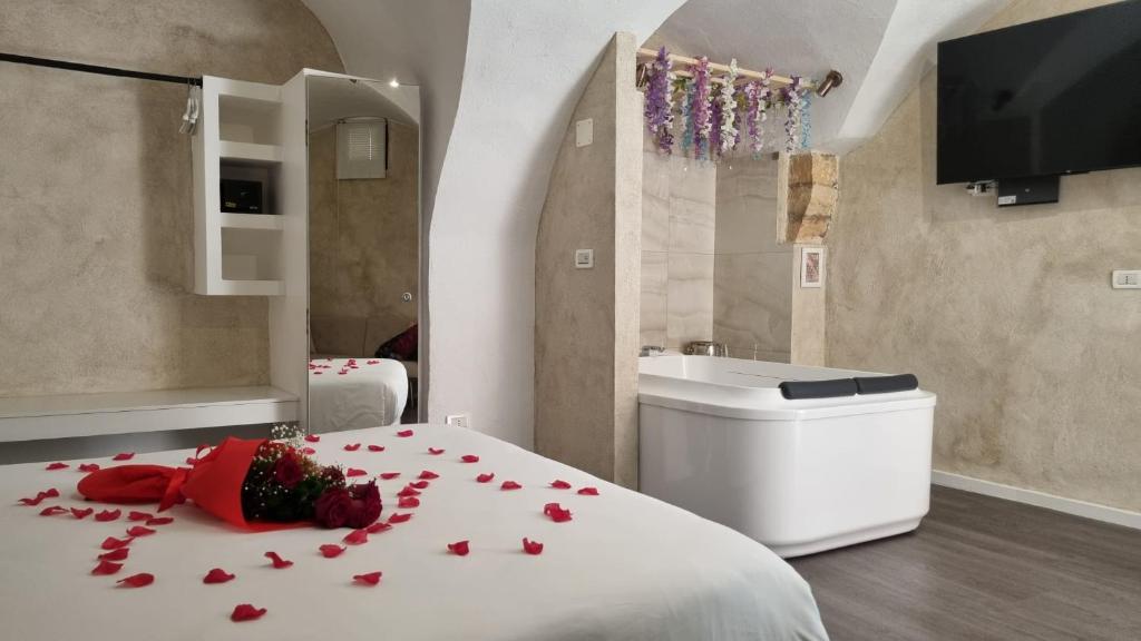 Postel nebo postele na pokoji v ubytování Luxy Gargano Suite