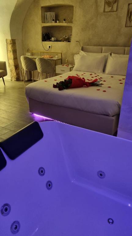 Postel nebo postele na pokoji v ubytování Luxy Gargano Suite