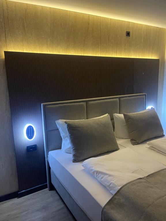 Postel nebo postele na pokoji v ubytování Hotel Heidelux