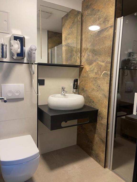 Koupelna v ubytování Hotel Heidelux