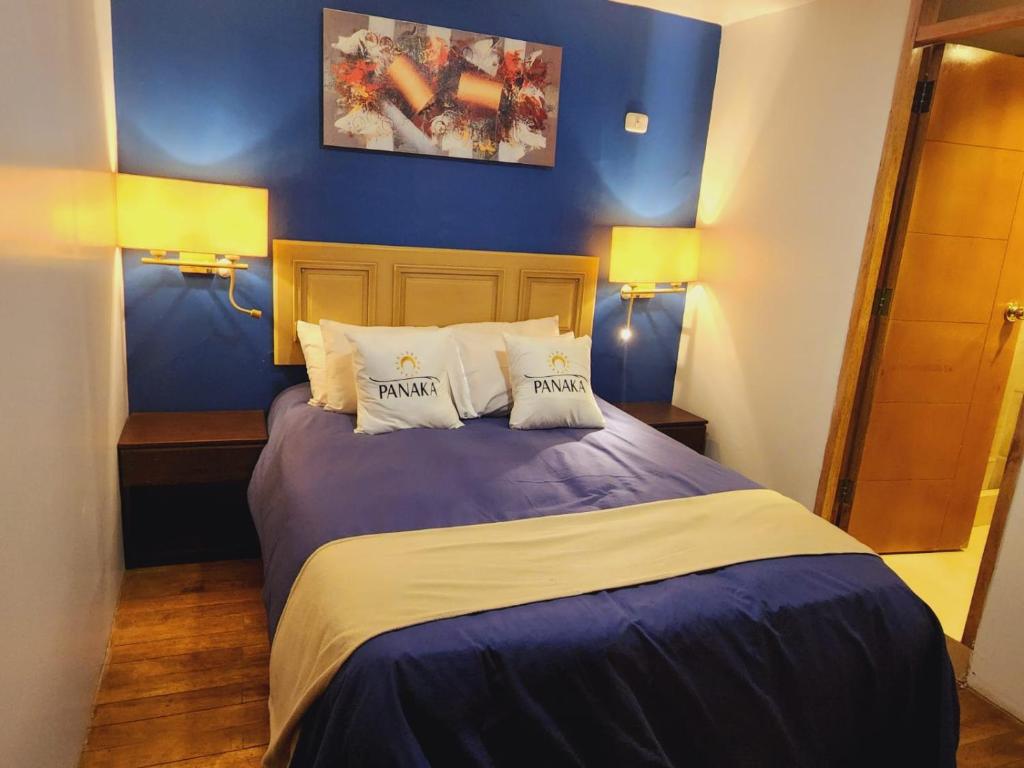 Postel nebo postele na pokoji v ubytování Hotel Panaka II
