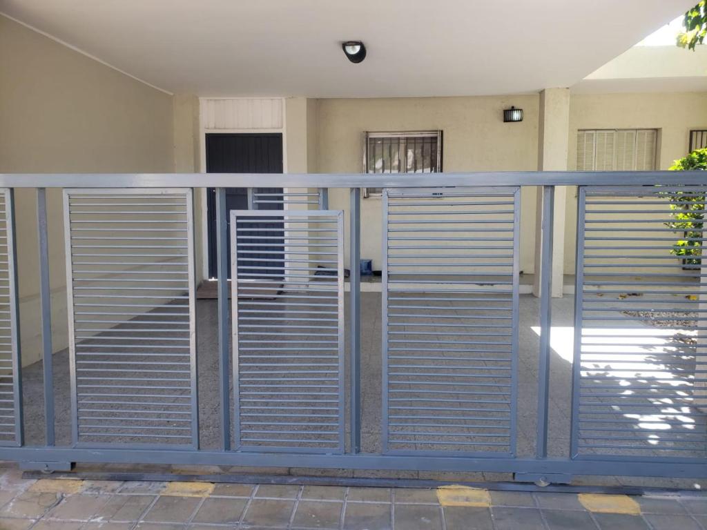 a metal fence in front of a building at Shanti Loft in San Juan
