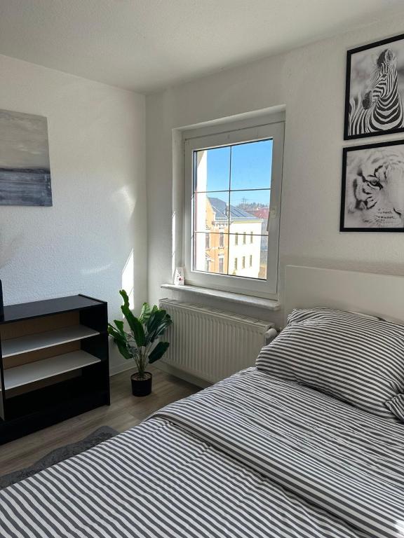 Postel nebo postele na pokoji v ubytování Rooms in Dresden
