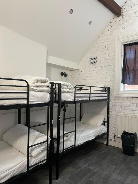 Postel nebo postele na pokoji v ubytování Rahman Hostel
