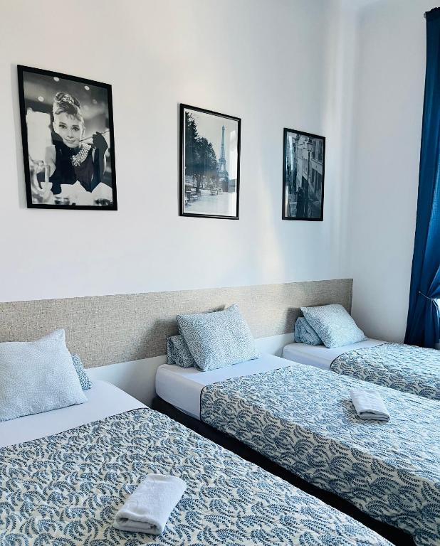 Postel nebo postele na pokoji v ubytování Art HOTEL