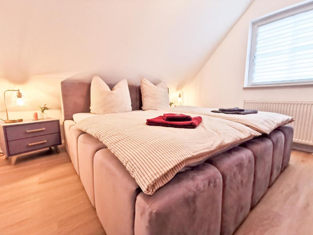 Postel nebo postele na pokoji v ubytování VoSsis Fewo Ferienwohnung