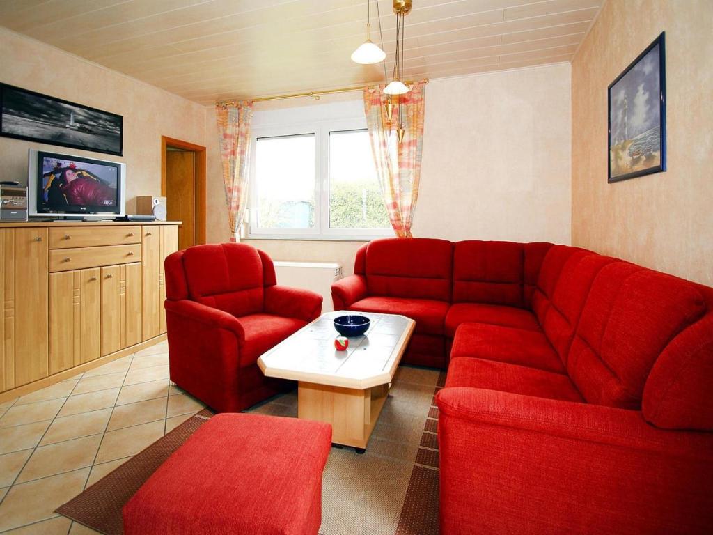 TV a/nebo společenská místnost v ubytování Bungalow Arielle, Dornumersiel