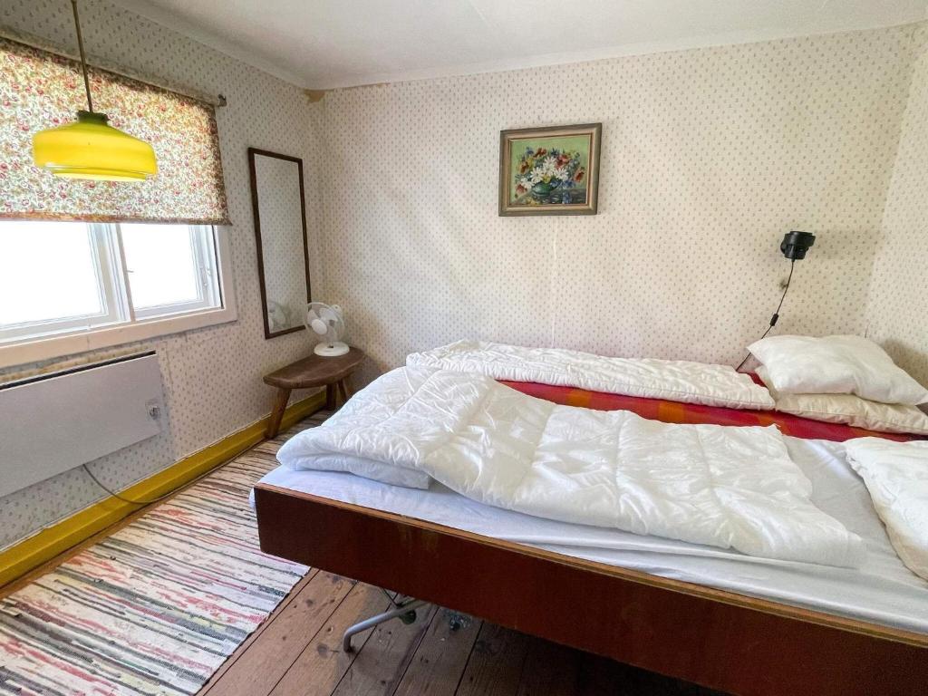 Postel nebo postele na pokoji v ubytování Holiday home SÖLVESBORG XVI