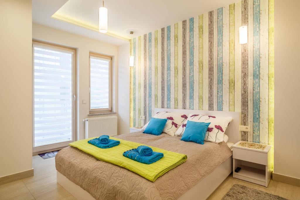 Posteľ alebo postele v izbe v ubytovaní TatryTop Stara Polana Spa