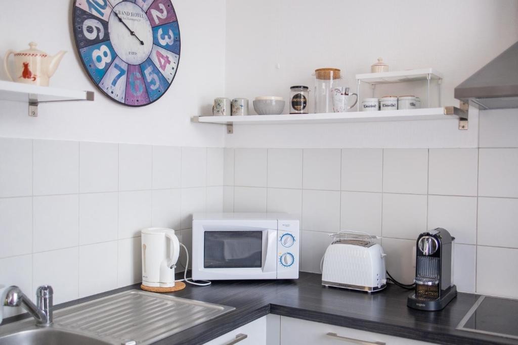 Kuchyňa alebo kuchynka v ubytovaní City center duplex loft