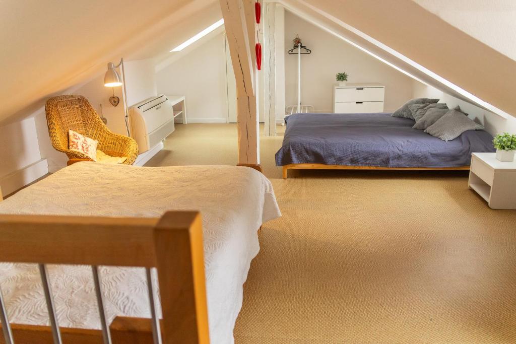 Posteľ alebo postele v izbe v ubytovaní City center duplex loft