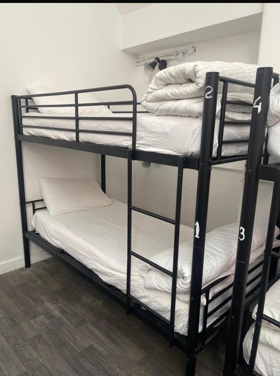 Postel nebo postele na pokoji v ubytování Rahman Hostel